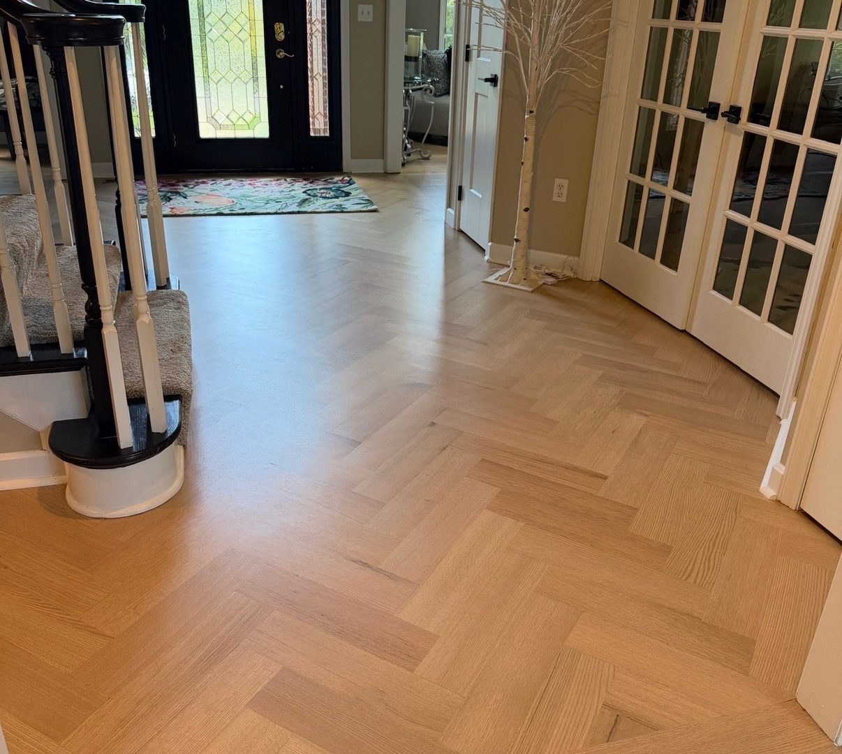 White oak herringbone hardwood floor installation in Pittsburgh home