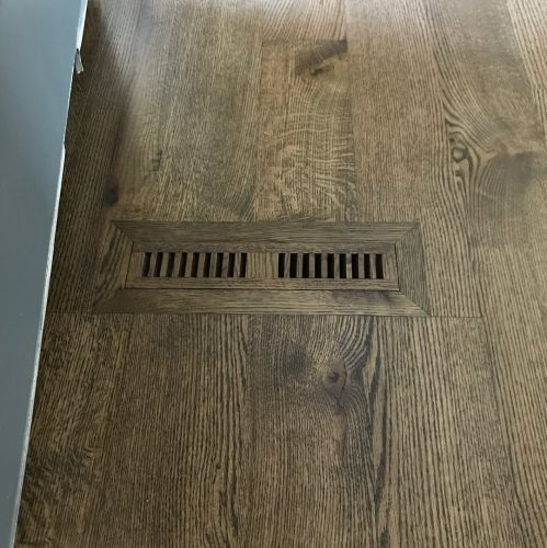 Before and after photos. This was a new install red oak 5 inch rift and quartered. Then we sand 5