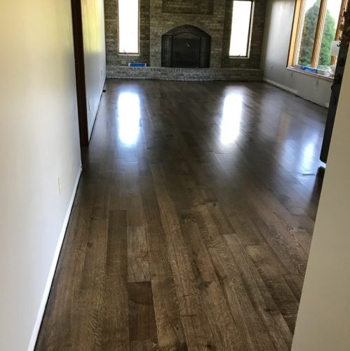 Before and after photos. This was a new install red oak 5 inch rift and quartered. Then we sand 9
